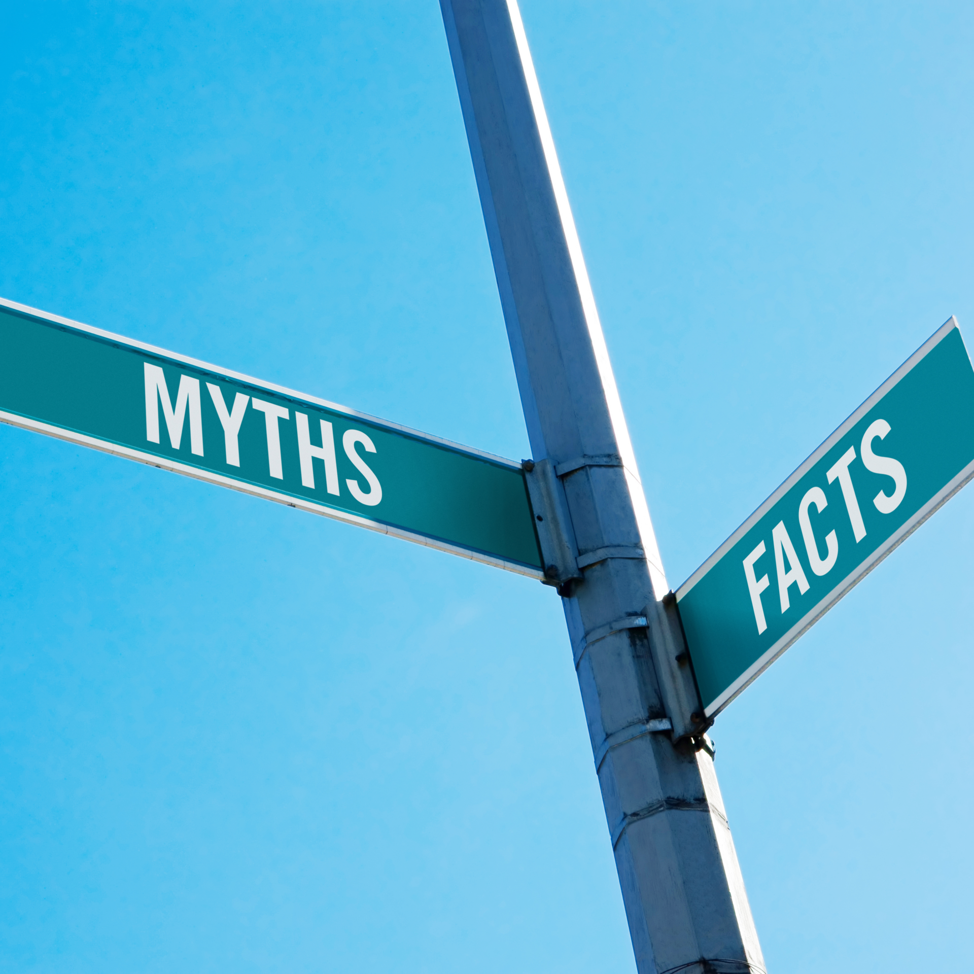 Street sign with myths and facts at the intersection, illustrating common misconceptions and truths about electronic data capture